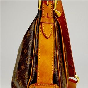 The Louis Vuitton Monogram Canvas Tulum GM